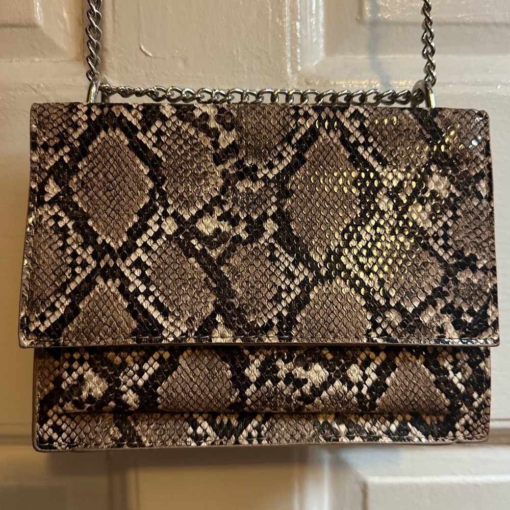 Leopard print crossbody bag.